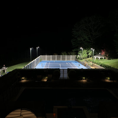 LED Light Fixtures + Hunter Green Light Poles for Backyard Tennis Court Lighting Project